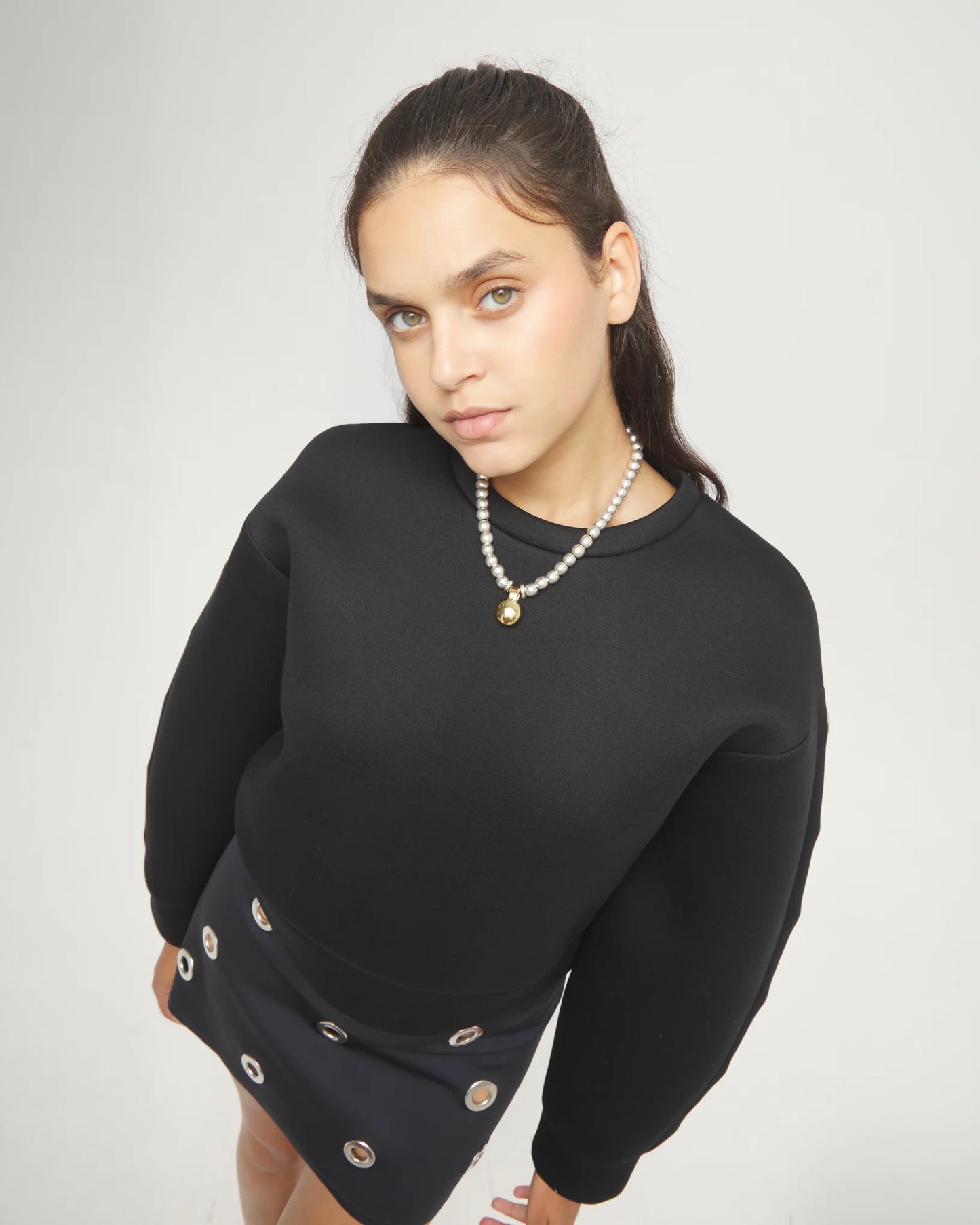 Beaded necklace with medium spheres and a large sphere