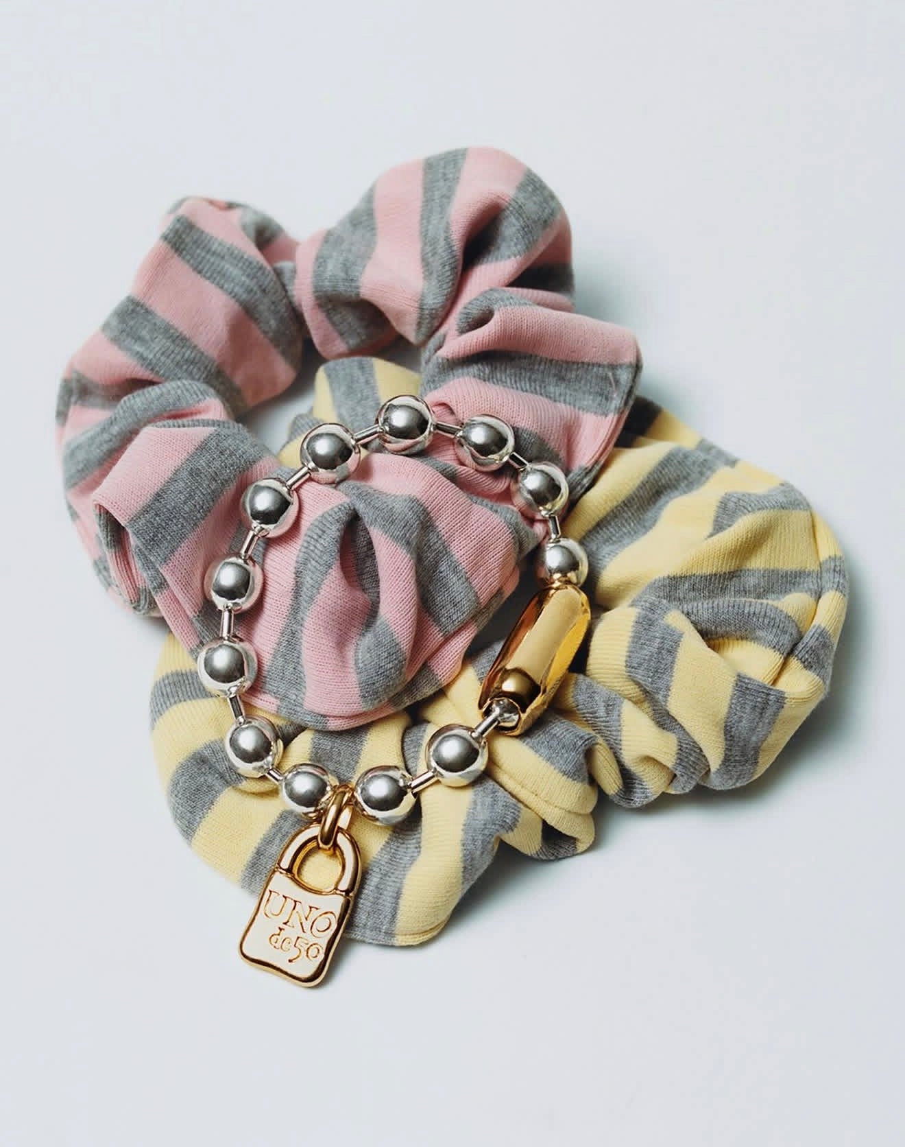 BEADED BRACELET WITH A 18K PLATED PADLOCK CHARM