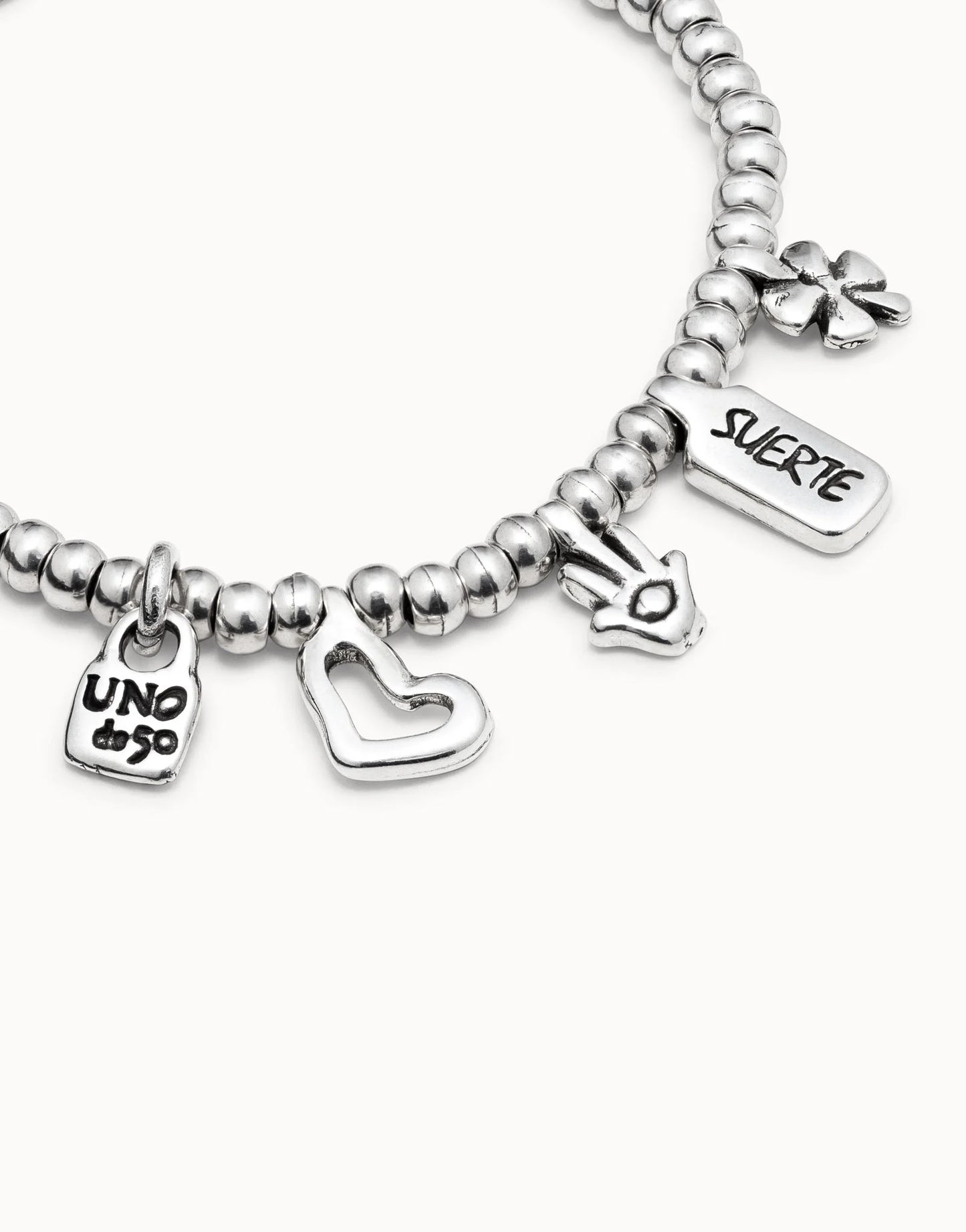 Beaded bracelet with charms