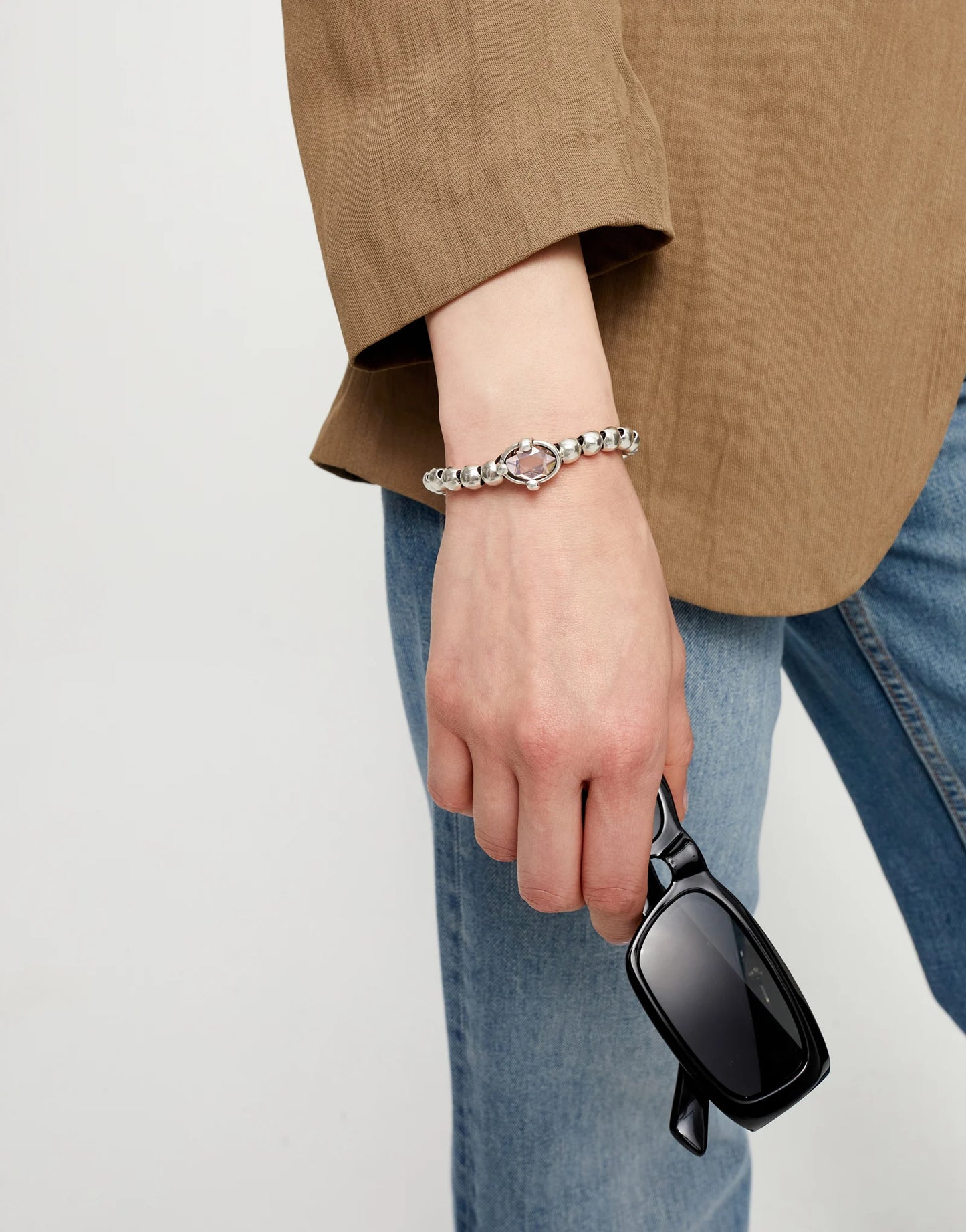 Beaded bracelet with pink oval faceted crystal