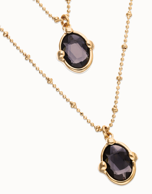 Multi strand necklace Gold with two black oval faceted crystals