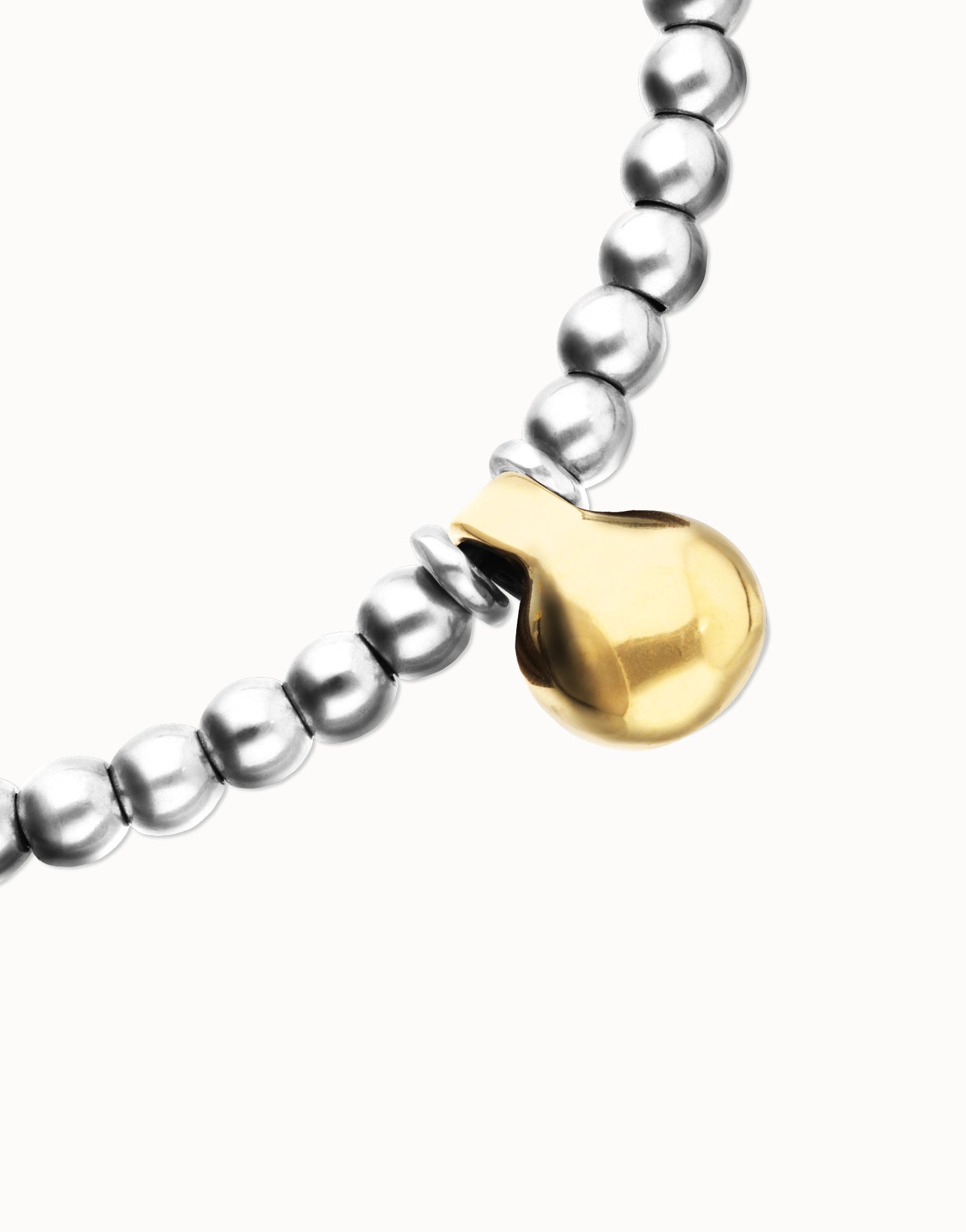 Beaded necklace with medium spheres and a large sphere