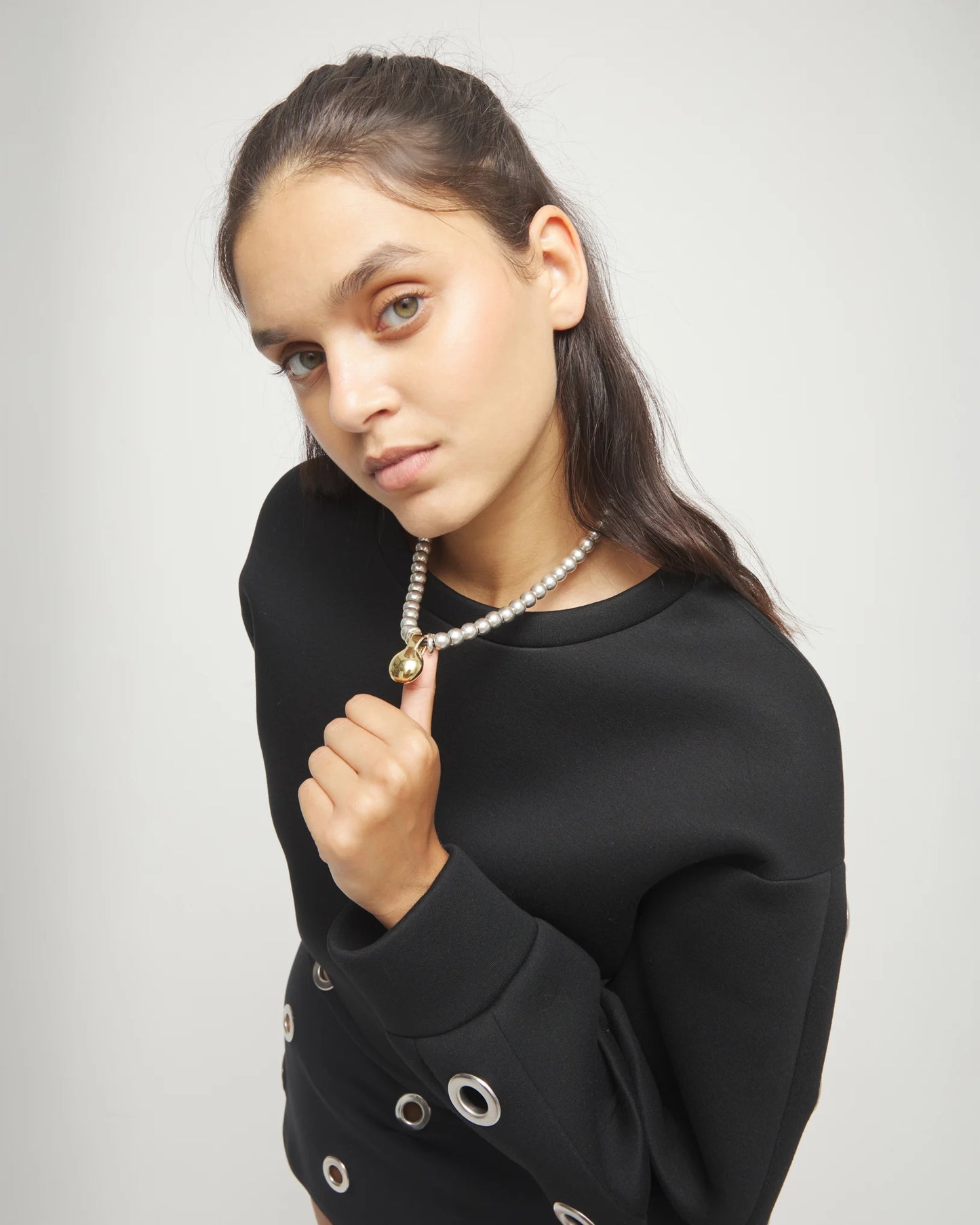 Beaded necklace with medium spheres and a large sphere