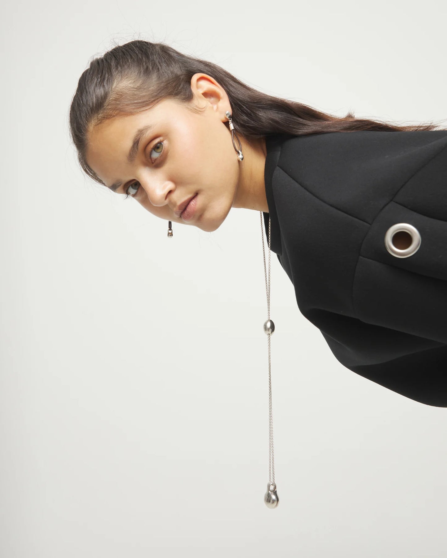 Long necklace with an adjustable chain and two weights
