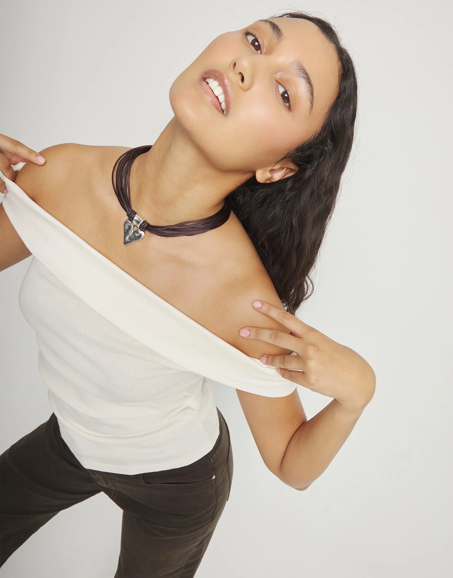 Brown leather and silk thread necklace with heart detail