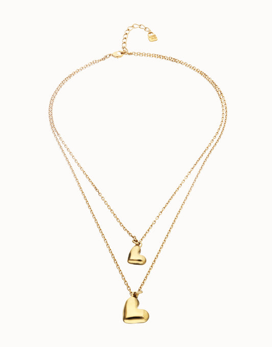 Multi strand chain necklace with two hearts