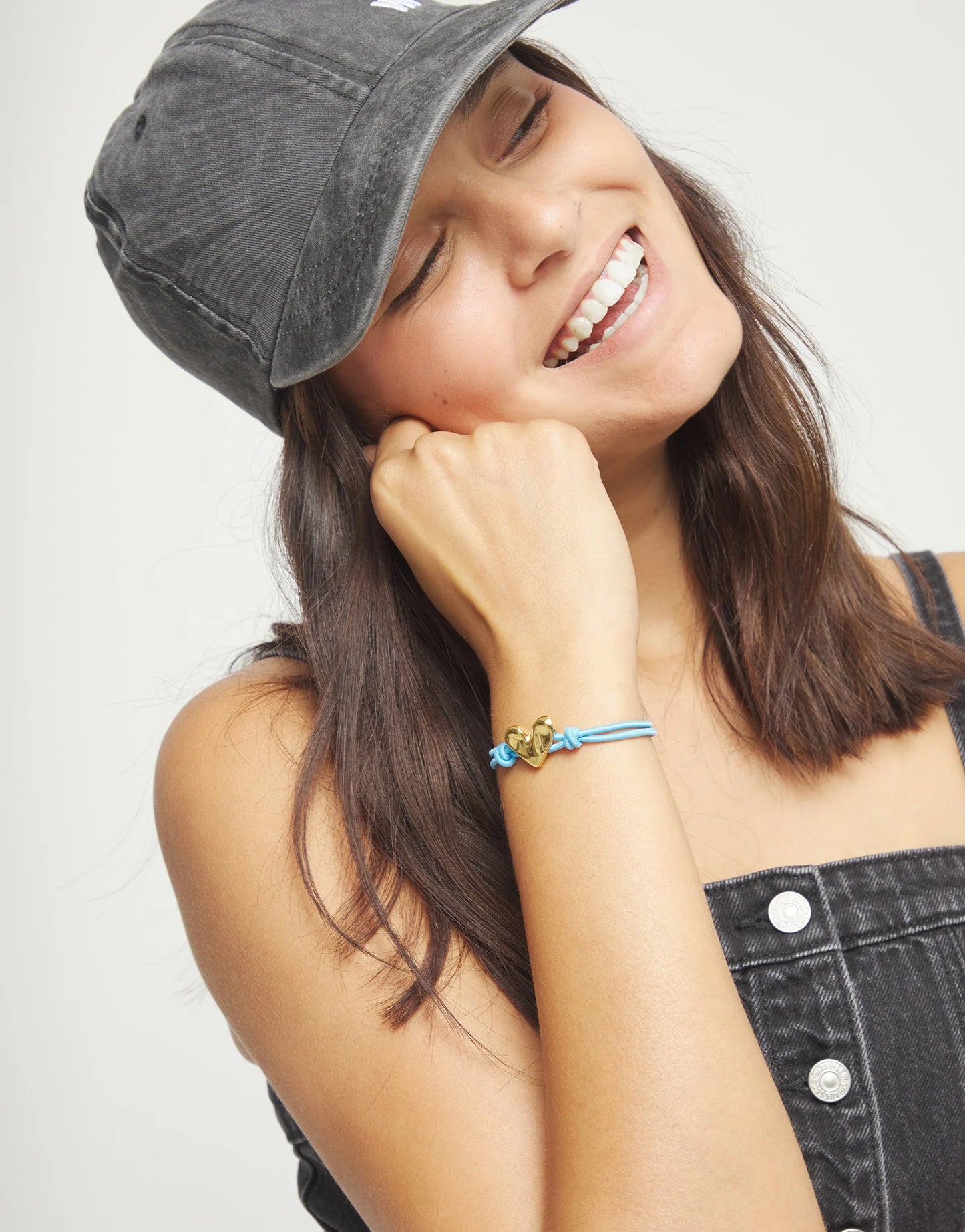 Blue elastic thread bracelet with heart