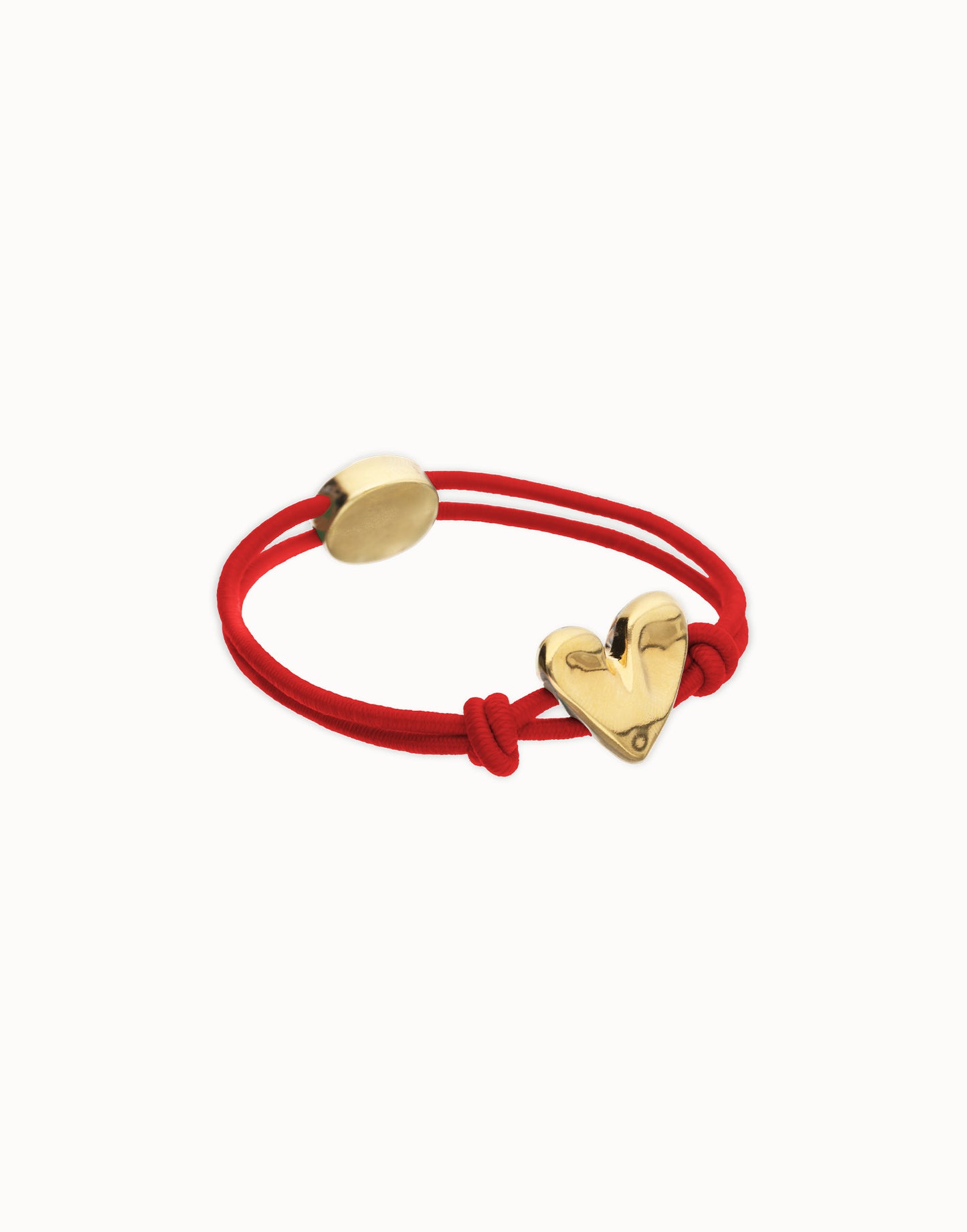 Red elastic thread bracelet with heart