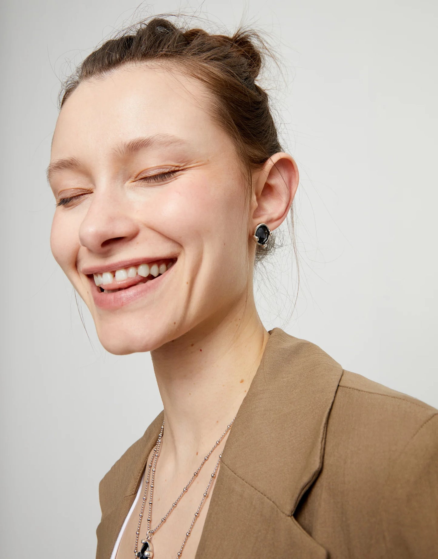 Studs with black oval faceted crystals