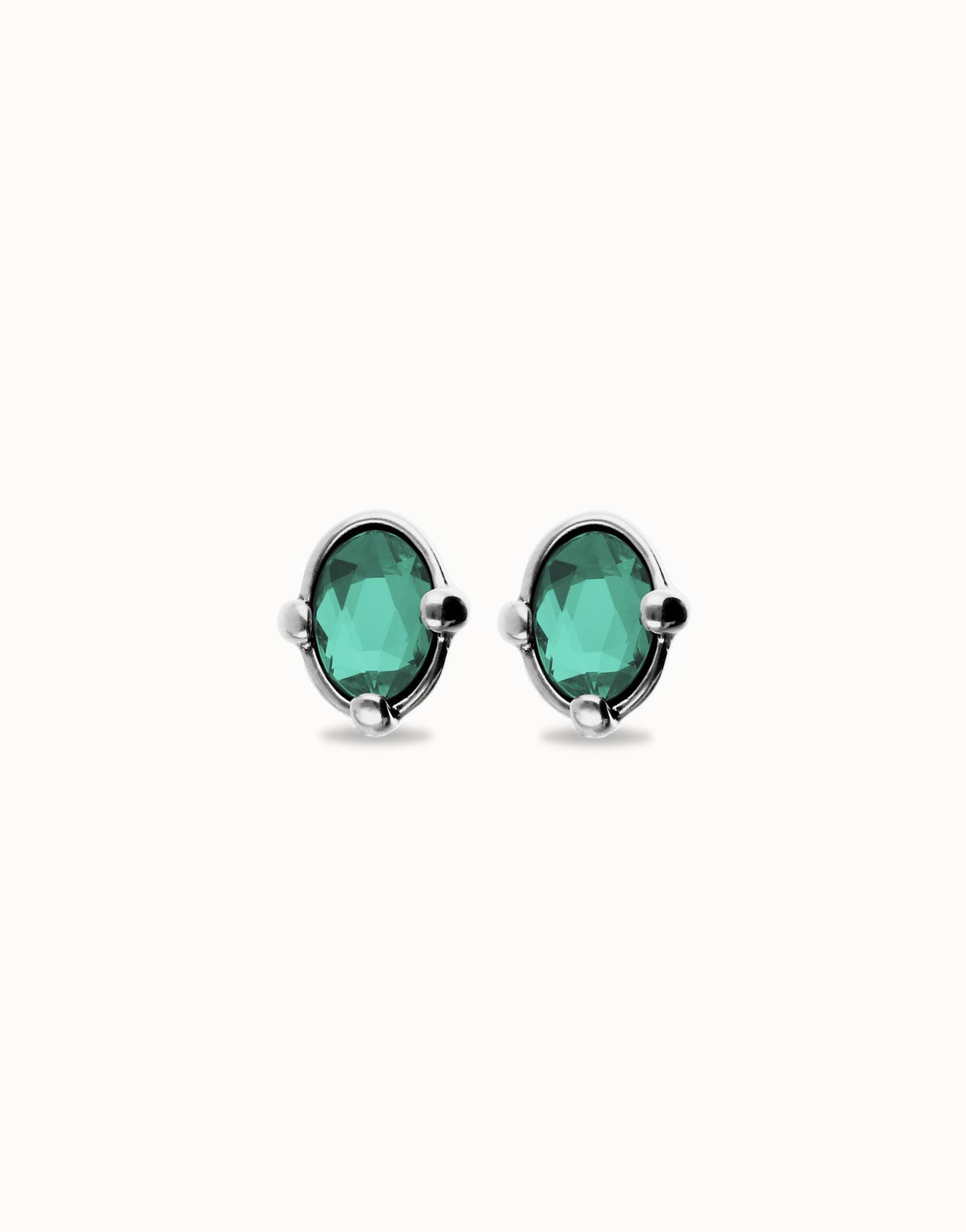 Studs with oval green faceted crystal
