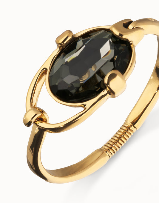 Rigid bracelet with gray oval faceted crystal