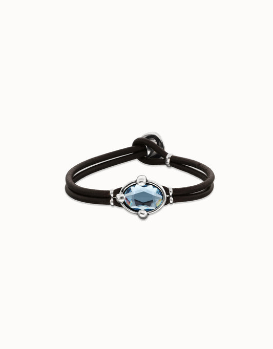 Leather bracelet with blue oval faceted crystal