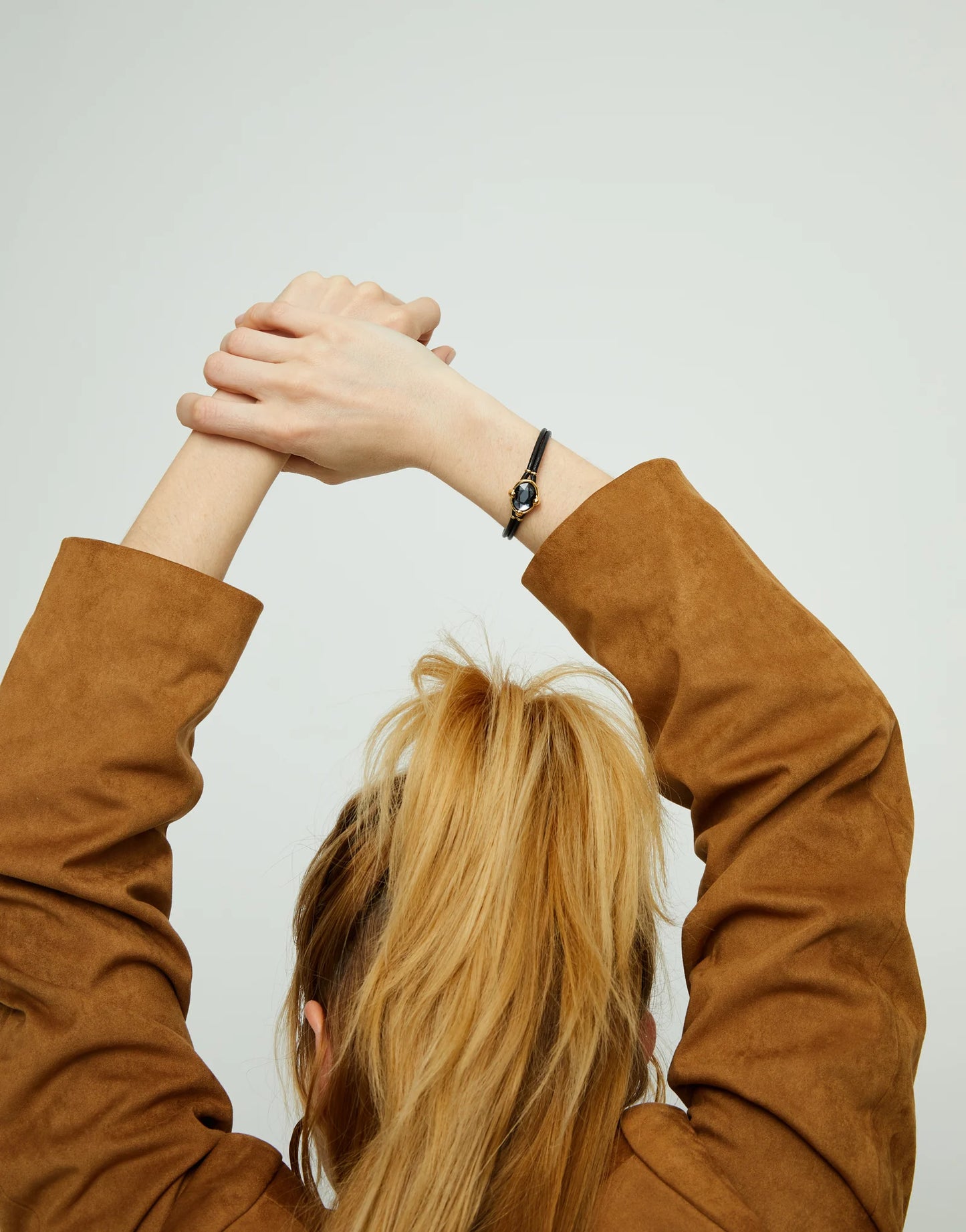 Leather bracelet with faceted black oval crystal