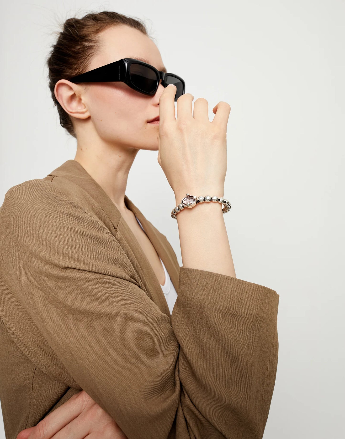 Beaded bracelet with pink oval faceted crystal