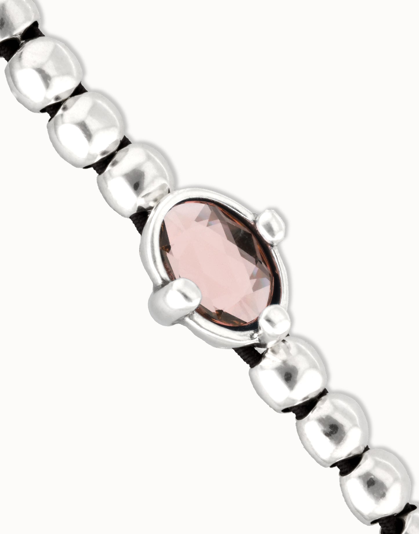 Beaded bracelet with pink oval faceted crystal