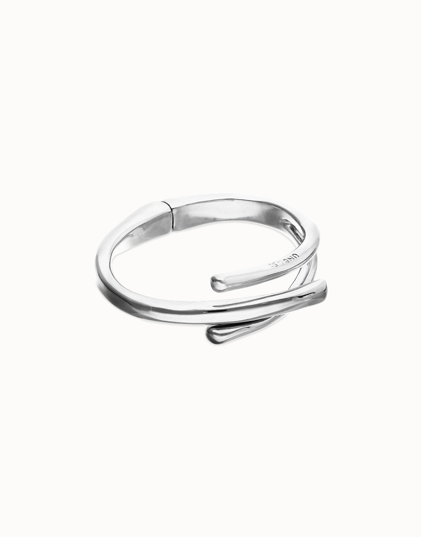 Bangle bracelet with three intertwined organic shapes